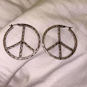 Metallic peace sign earrings